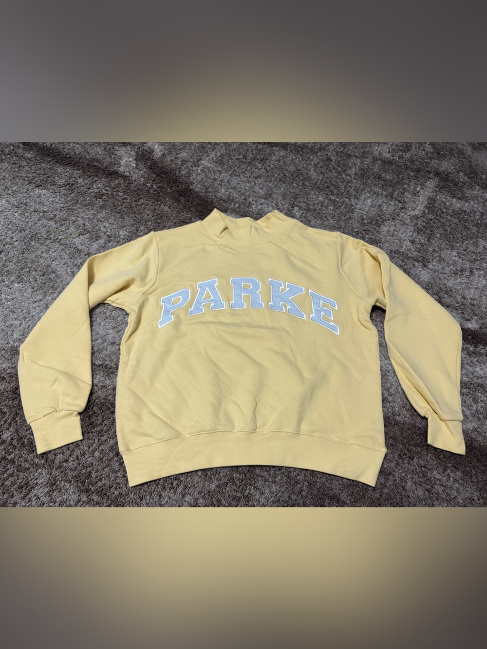 Parke woman’s yellow Crewneck